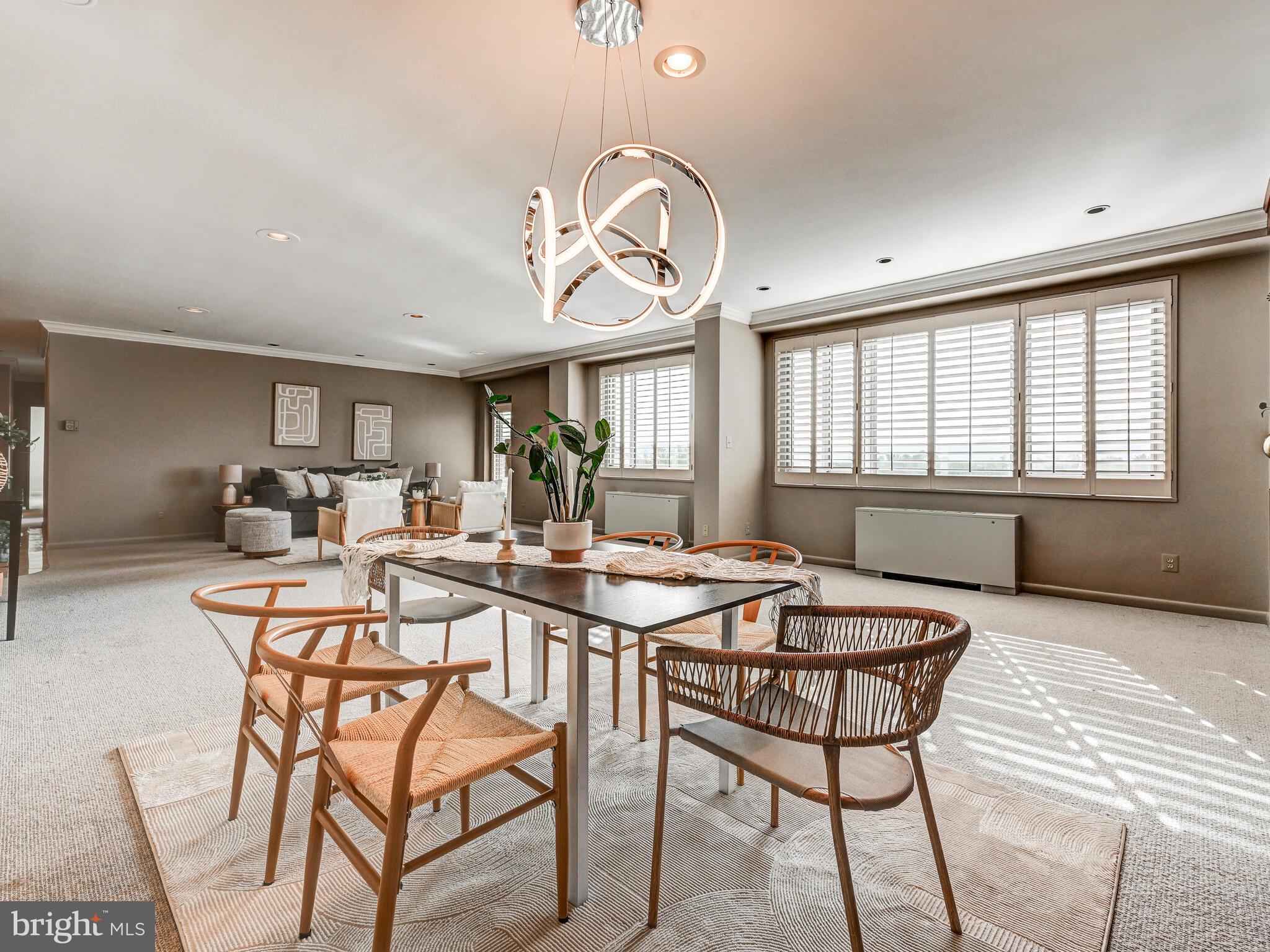 11 Slade Avenue, Unit 912 Baltimore, MD 21208 - Photo 9 of 31 a view of a dining room with furniture window and outside view