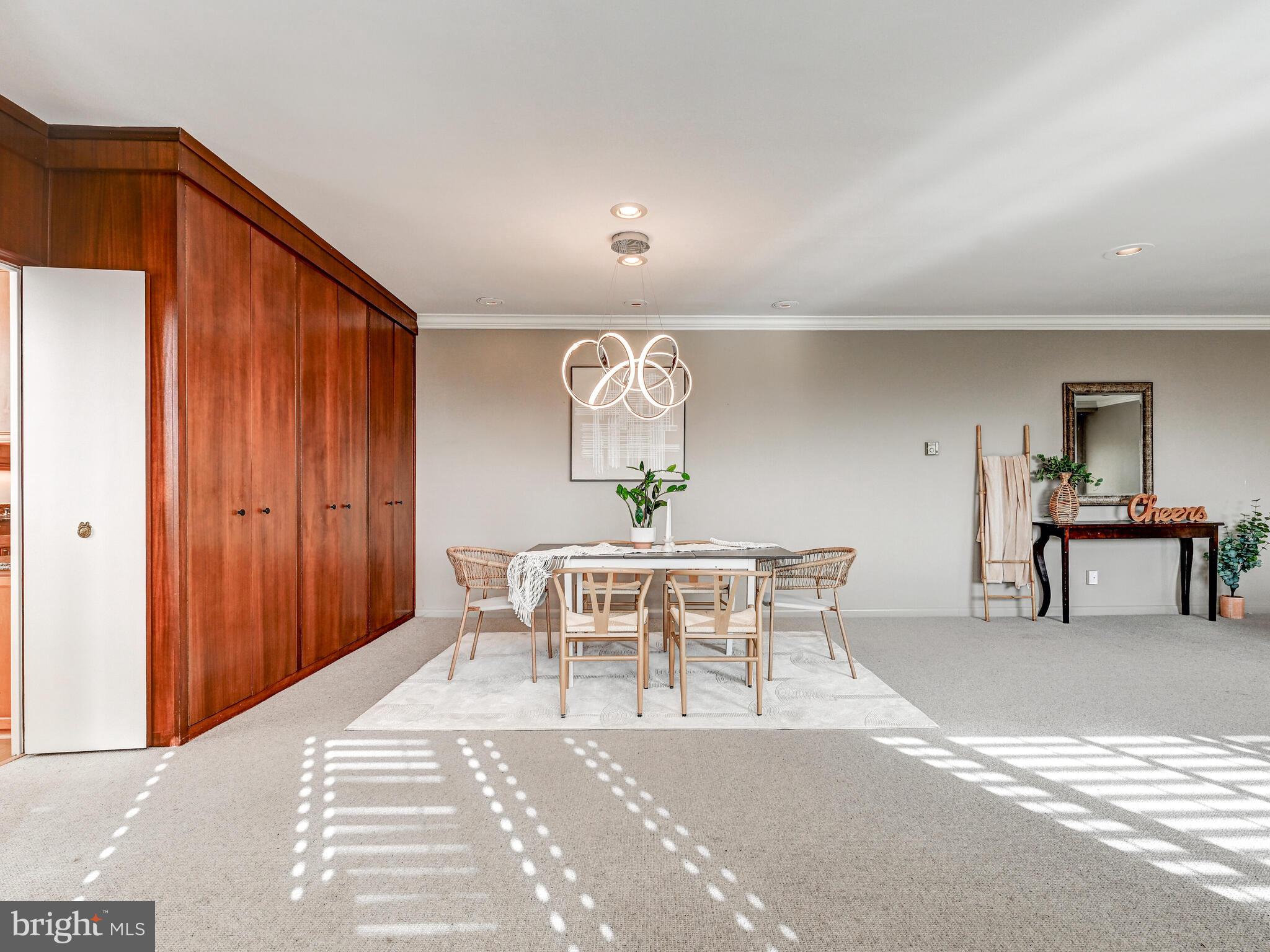 11 Slade Avenue, Unit 912 Baltimore, MD 21208 - Photo 10 of 31 a view of a livingroom with furniture and wooden floor