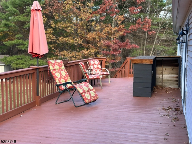 5 Twin Pond Road Montague, NJ 07827 - Photo 24 of 29 a view of a patio with a table and chairs