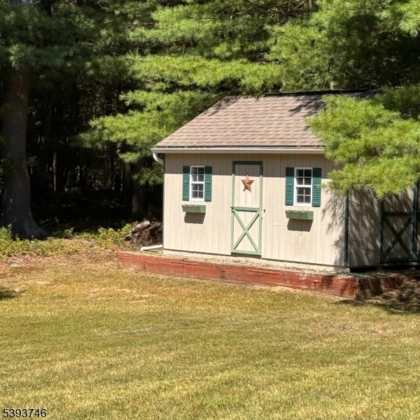 5 Twin Pond Road Montague, NJ 07827 - Photo 28 of 29 a front view of a house with a yard