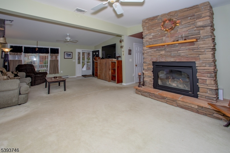 5 Twin Pond Road Montague, NJ 07827 - Photo 7 of 29 a living room with furniture and a fireplace