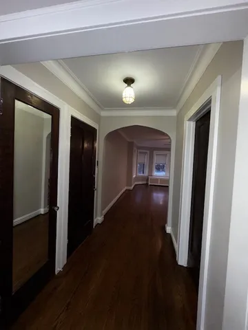 a view of gallery with wooden floor