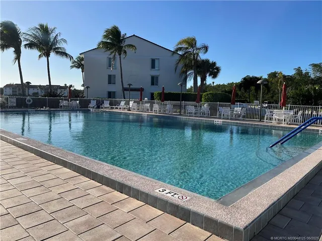 a view of deck with wooden floor and outdoor seating