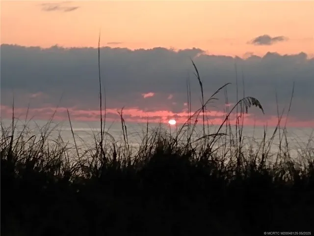 a view of outside space and a lake view