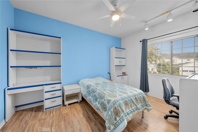 a bathroom with a sink toilet and a mirror