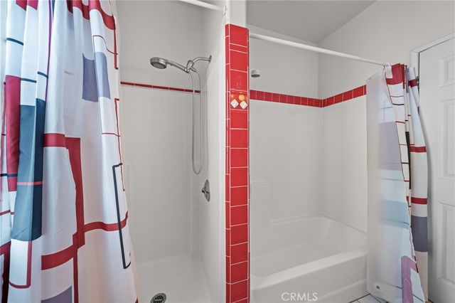 a bed room with a bed and a desk