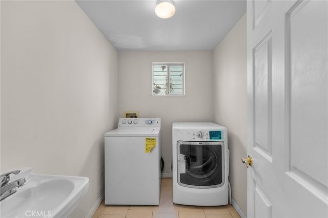 a bathroom with a sink toilet and vanity