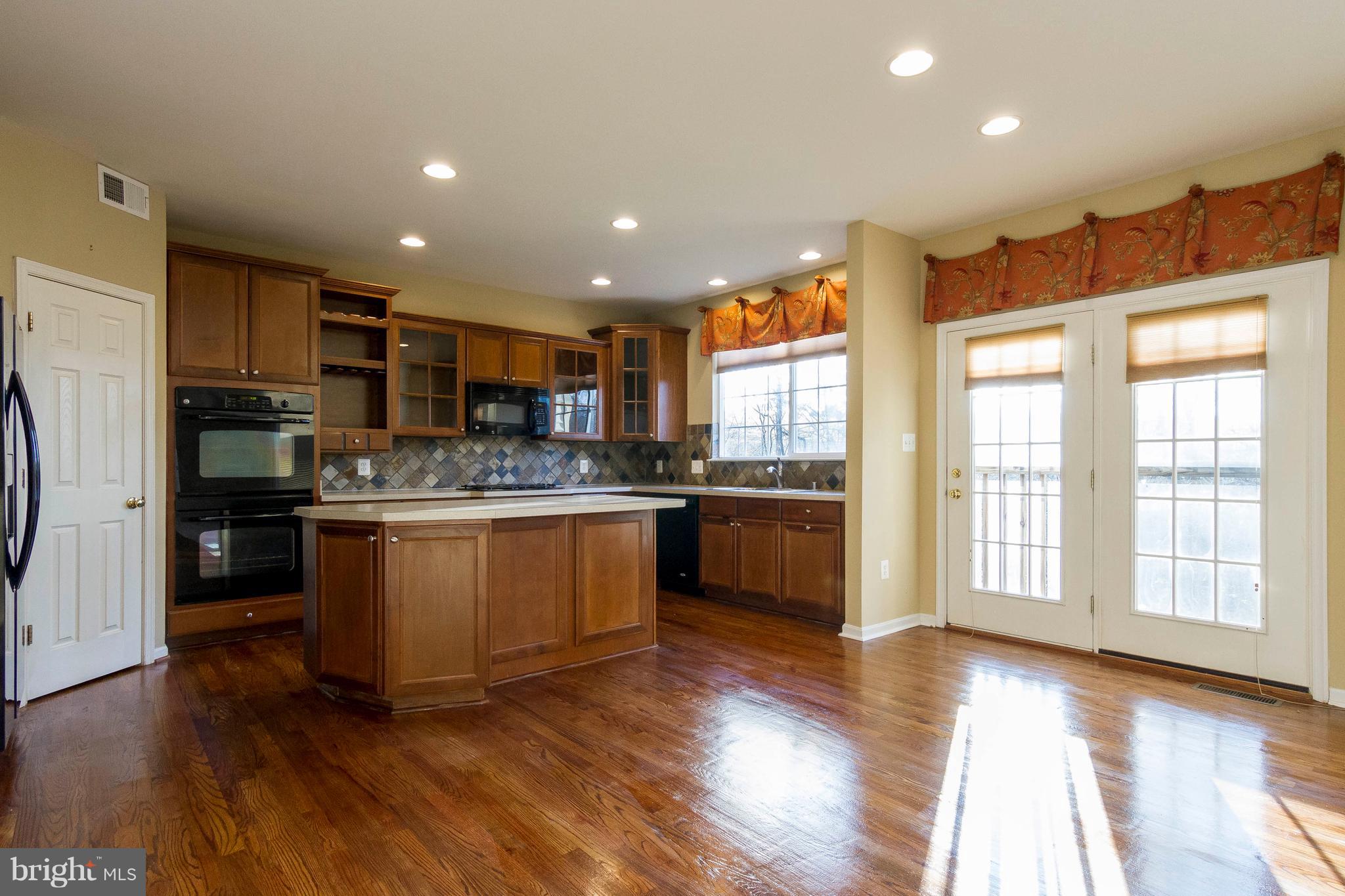 817 Kingsbrook Road Culpeper, VA 22701 - Photo 12 of 38 Kitchen Open to Family Room