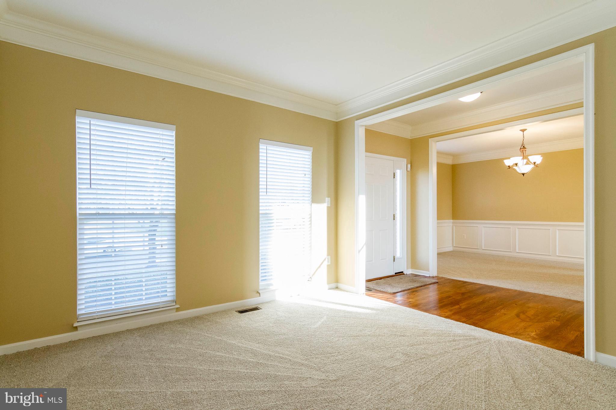 817 Kingsbrook Road Culpeper, VA 22701 - Photo 6 of 38 Formal Living Room with Crown Molding