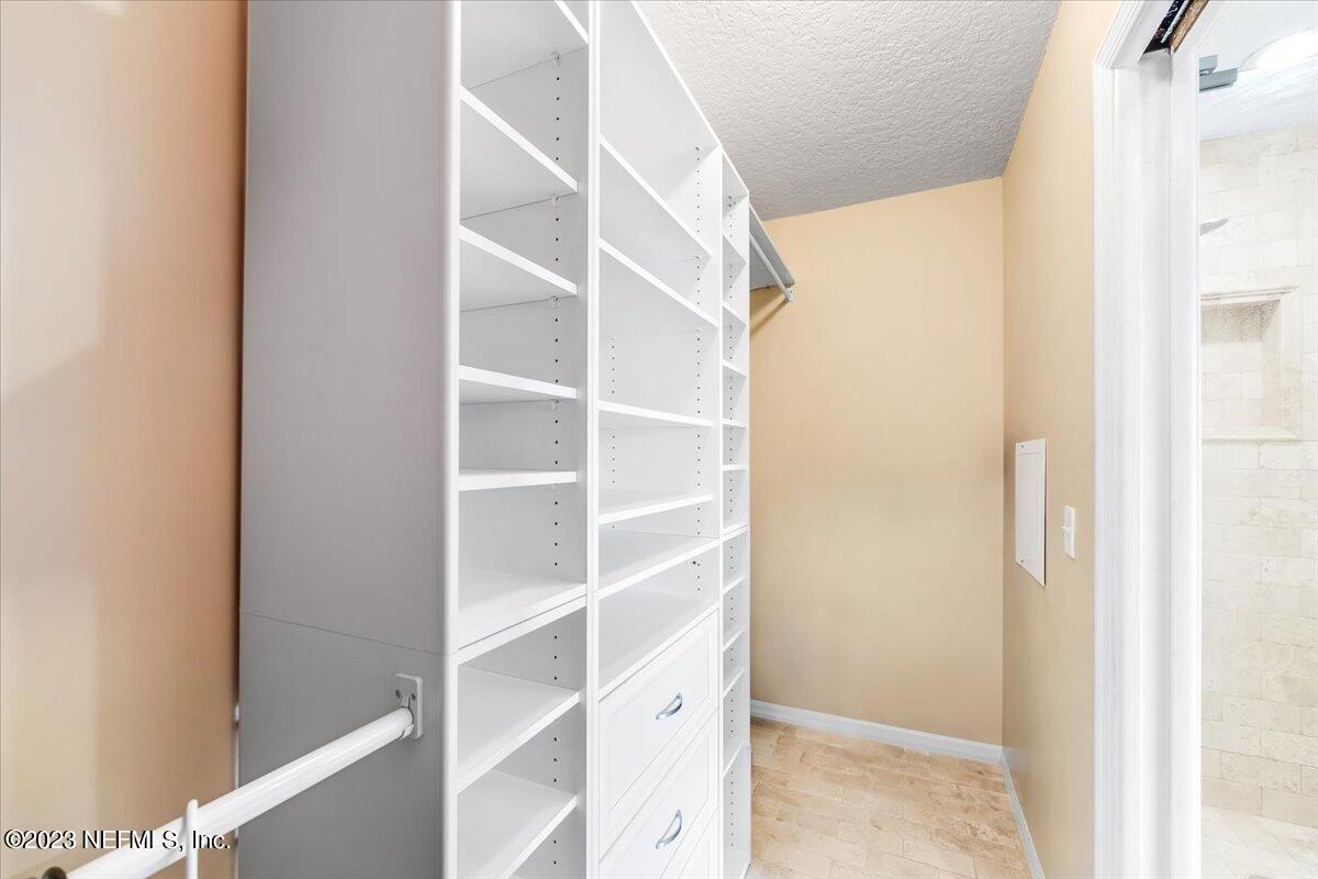 4616 Estates Street Macclenny, FL 32063 - Photo 21 of 32 a view of an empty walk in closet