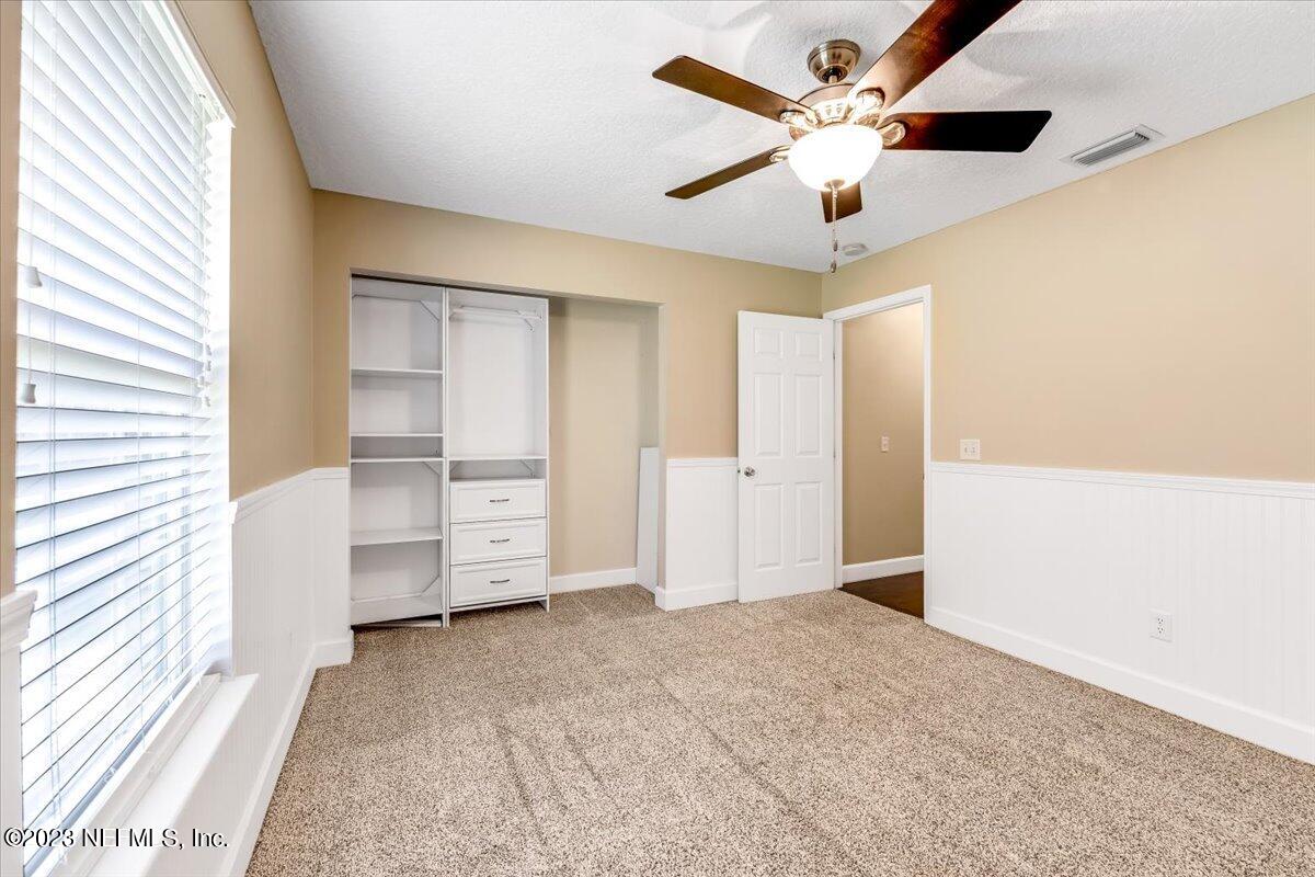 4616 Estates Street Macclenny, FL 32063 - Photo 23 of 32 a view of an empty room with a window