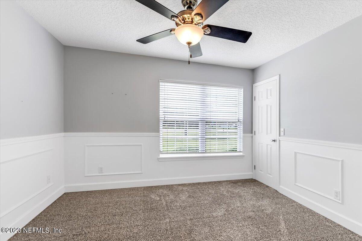 4616 Estates Street Macclenny, FL 32063 - Photo 24 of 32 a view of an empty room with a window