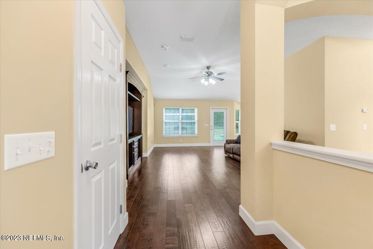 4616 Estates Street Macclenny, FL 32063 - Photo 5 of 32 a view of an entryway with wooden floor
