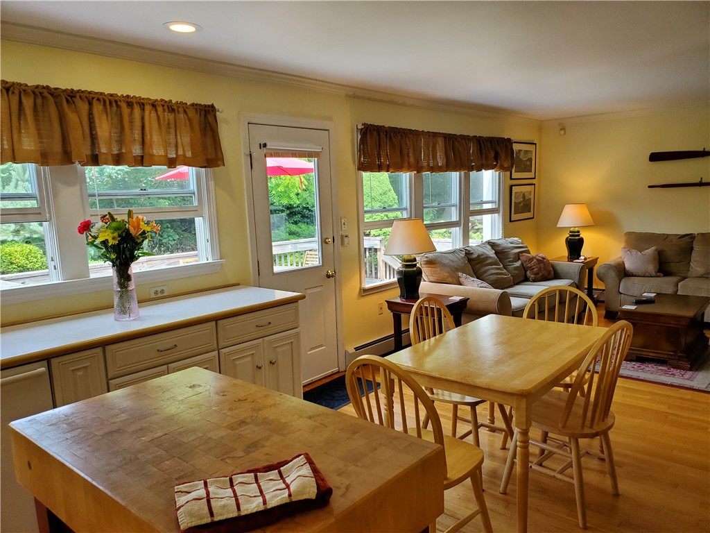 4 Key Court Newport, RI 02840 - Photo 19 of 49 Eat in Kitchen & family Room view to back deck