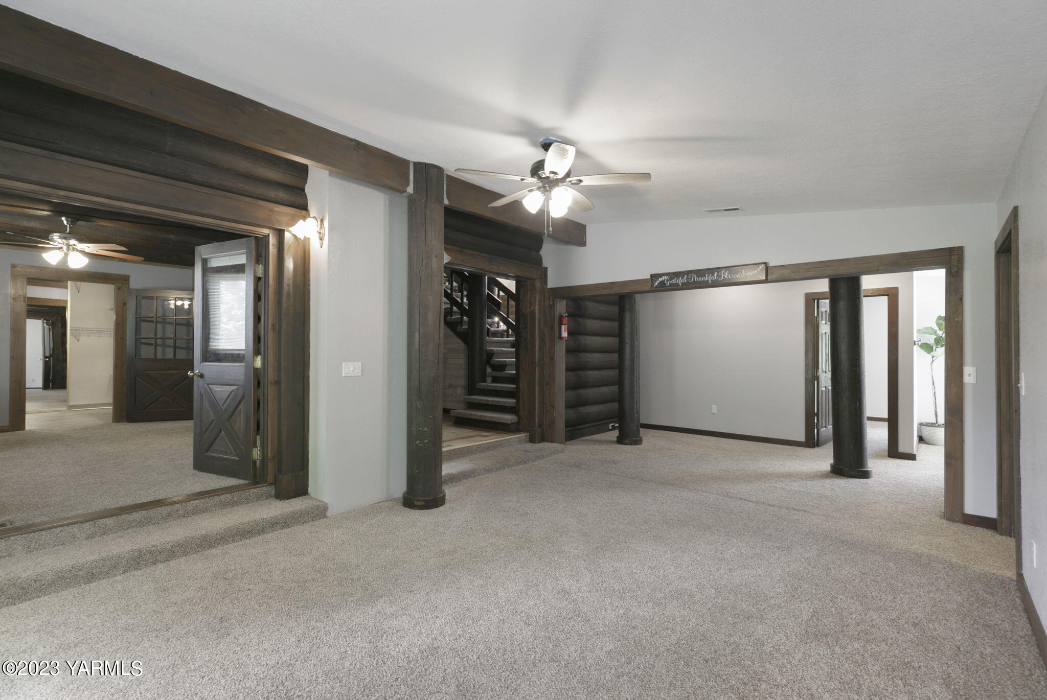 7903 Meadowbrook Road Yakima, WA 98903 - Photo 16 of 32 a view of a livingroom with a ceiling fan