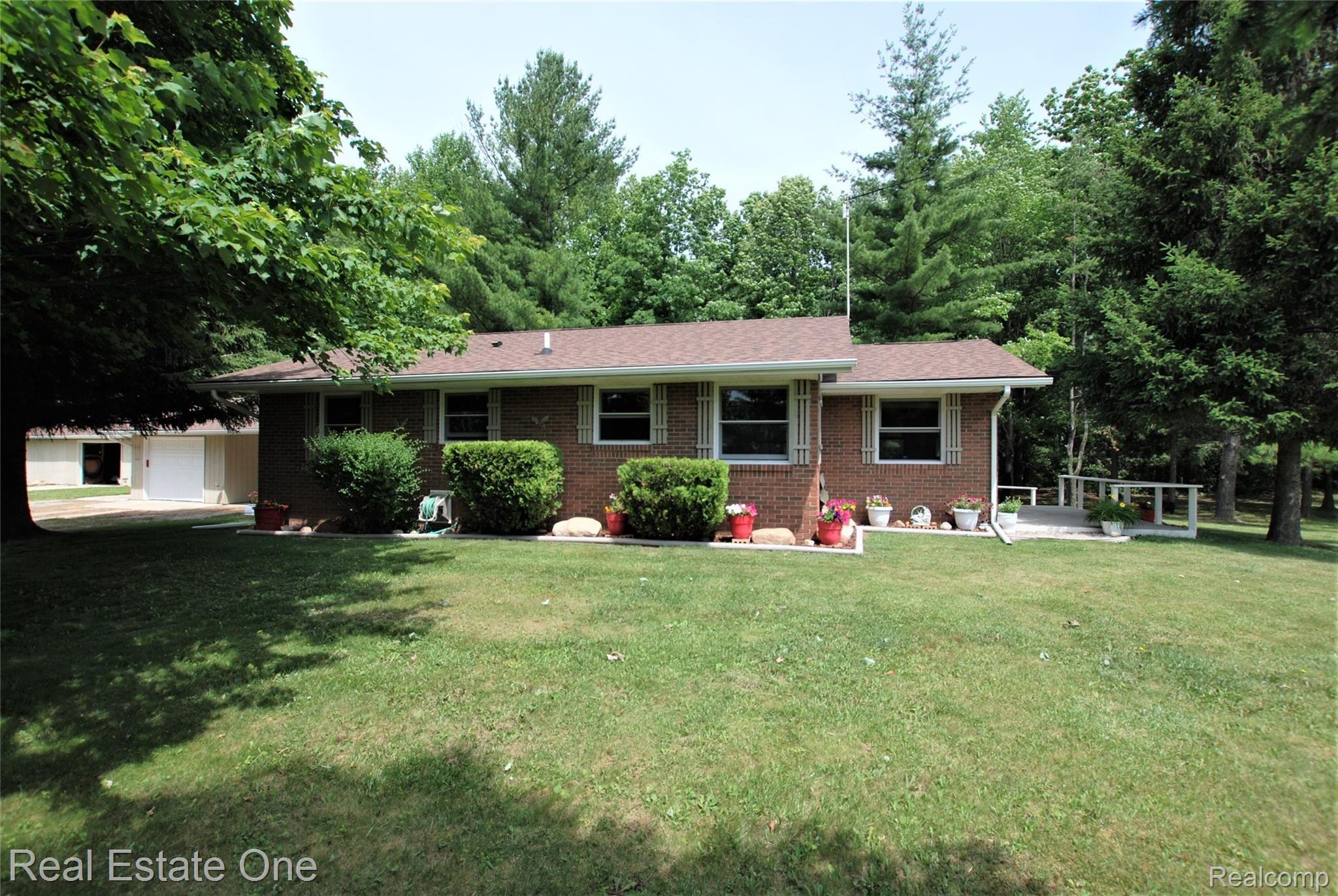 6185 Bricker Road Avoca, MI 48006 - Photo 1 of 32 Welcome to this Country Retreat - All brick ranch on 5 lovely acres!