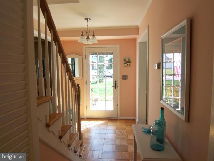 28 Severndale Road Severna Park, MD 21146 - Photo 2 of 25 Hardwood floors, natural light & coral colors.