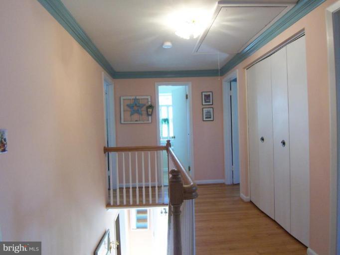 28 Severndale Road Severna Park, MD 21146 - Photo 15 of 25 accented by crown molding&hardwood flrs & banister