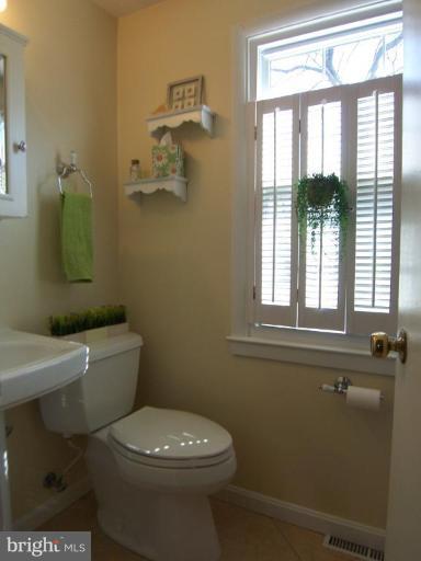 28 Severndale Road Severna Park, MD 21146 - Photo 17 of 25 updated bath w/ shower, large ceramic tiles
