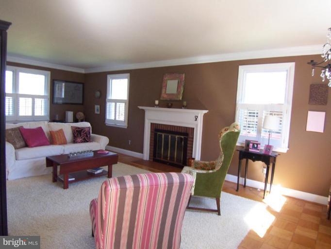 28 Severndale Road Severna Park, MD 21146 - Photo 3 of 25 Lovely living room w/ masonry fireplace