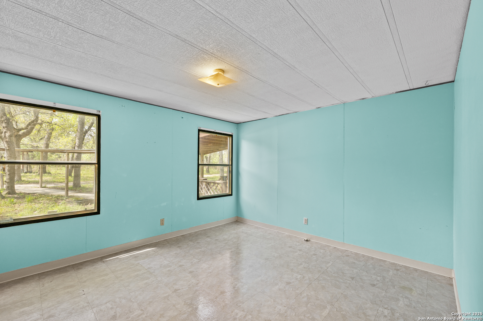 1189 Vivroux Ranch Road Seguin, TX 78155 - Photo 21 of 24 a view of an empty room with a window
