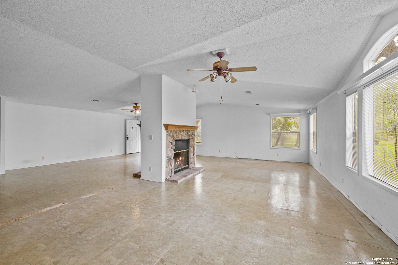 1189 Vivroux Ranch Road Seguin, TX 78155 - Photo 4 of 24 wooden floor in an empty room with a window