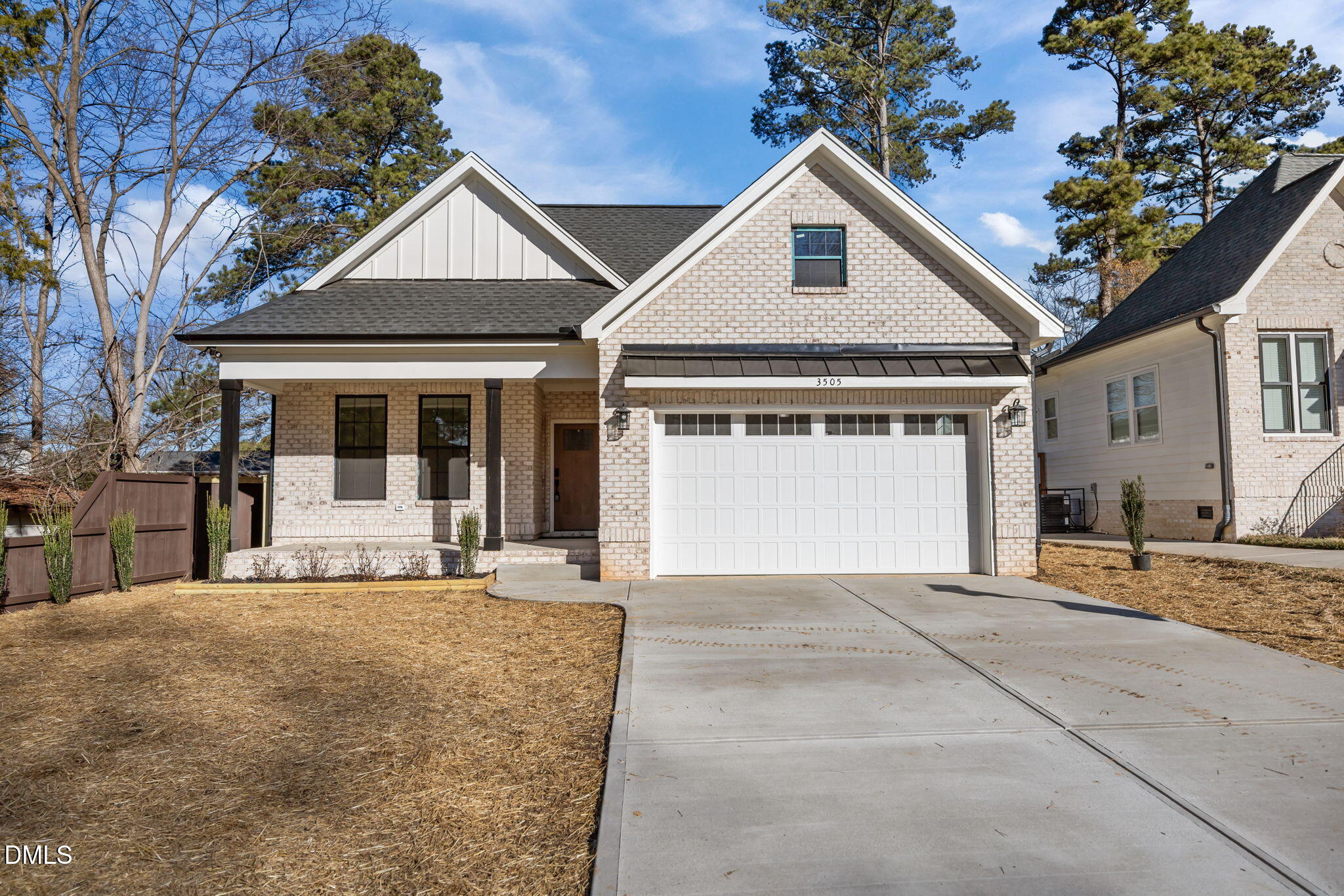 3505 Skycrest Drive Raleigh, NC 27604 - Photo 3 of 45 a front view of a house with a yard and garage