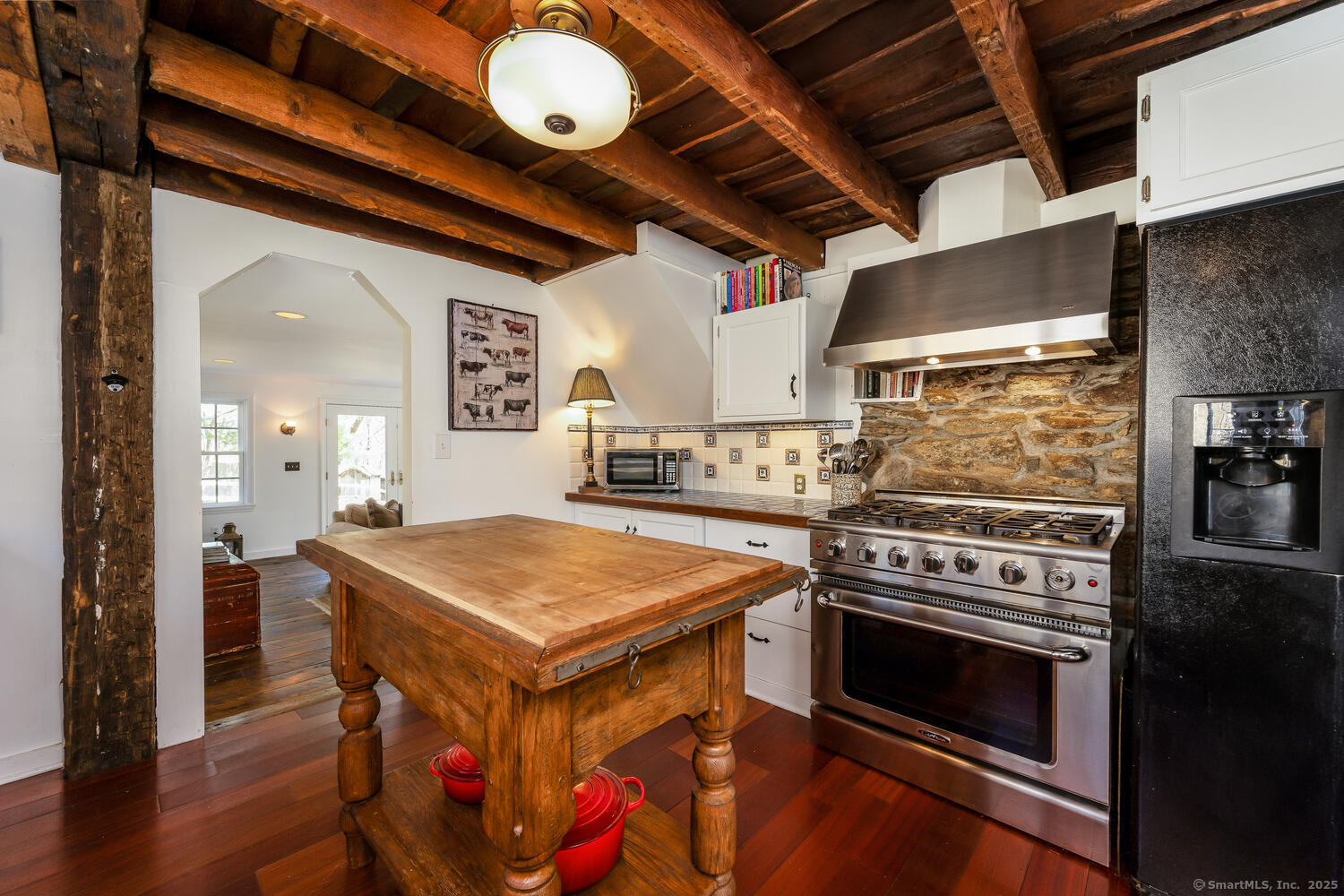 175 Mountain Road Wilton, CT 06897 - Photo 13 of 40 a kitchen with a stove and a refrigerator