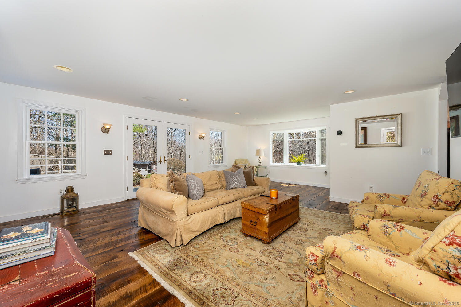 175 Mountain Road Wilton, CT 06897 - Photo 17 of 40 a living room with furniture window and a lamp