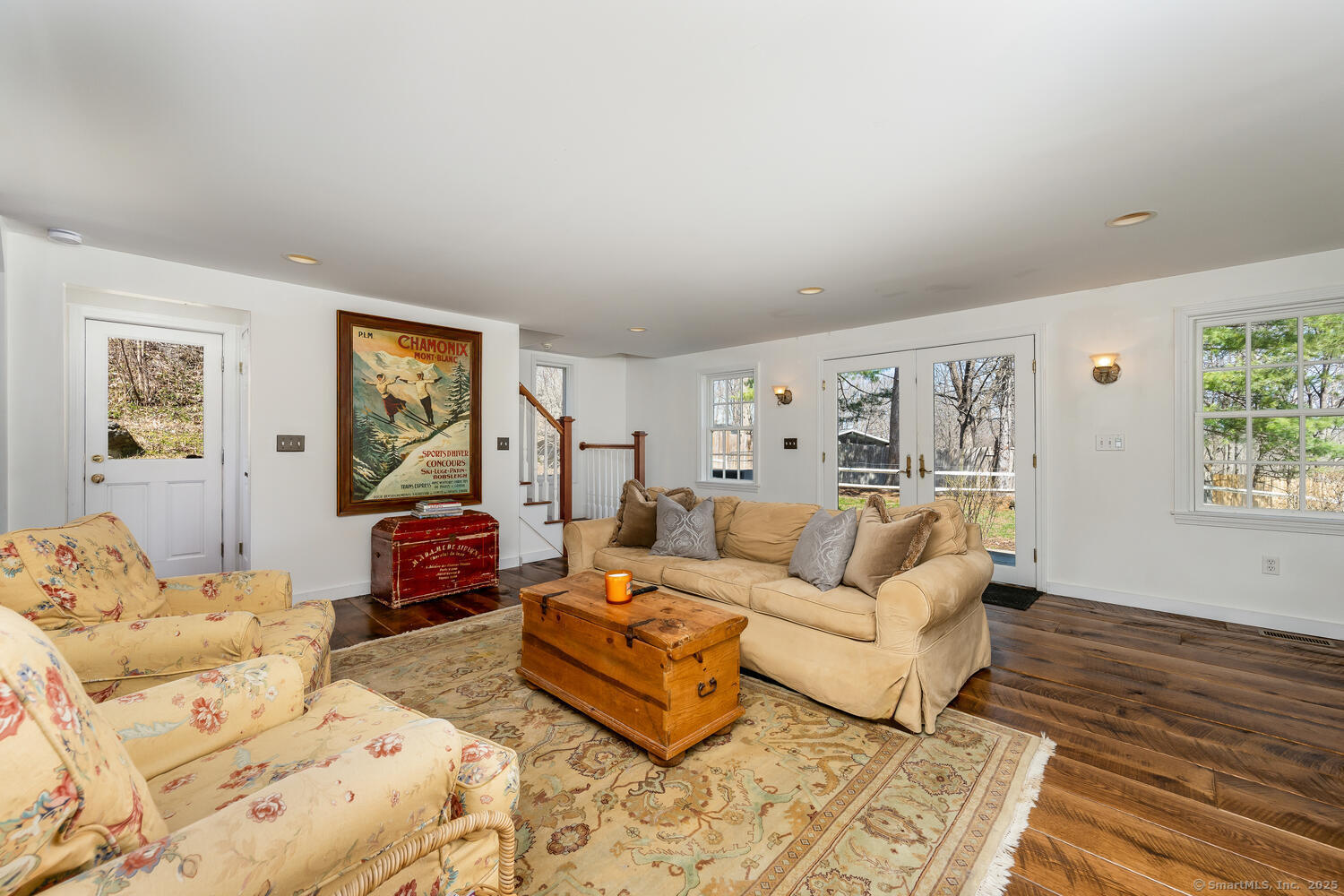 175 Mountain Road Wilton, CT 06897 - Photo 19 of 40 a living room with furniture and a wooden floor