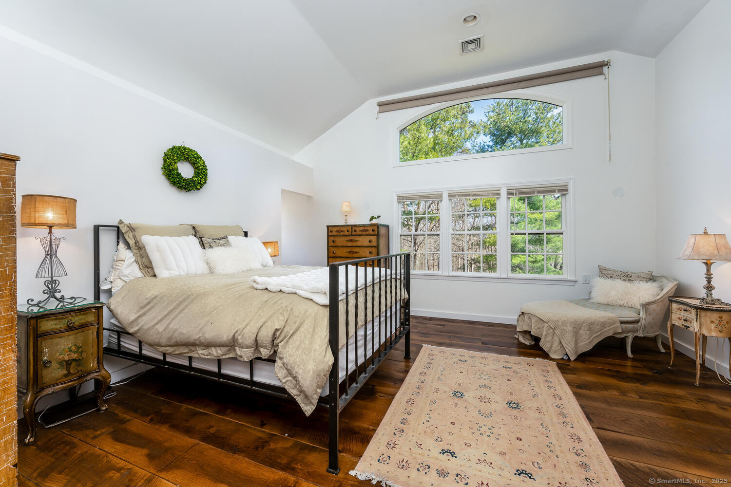 175 Mountain Road Wilton, CT 06897 - Photo 21 of 40 a bedroom with a bed and a window