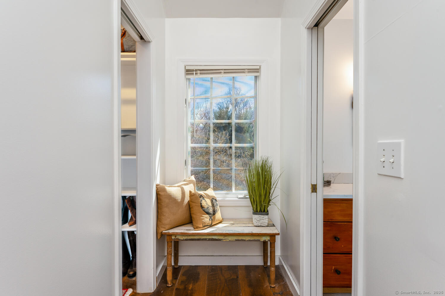 175 Mountain Road Wilton, CT 06897 - Photo 23 of 40 a view of a living room with furniture and a window