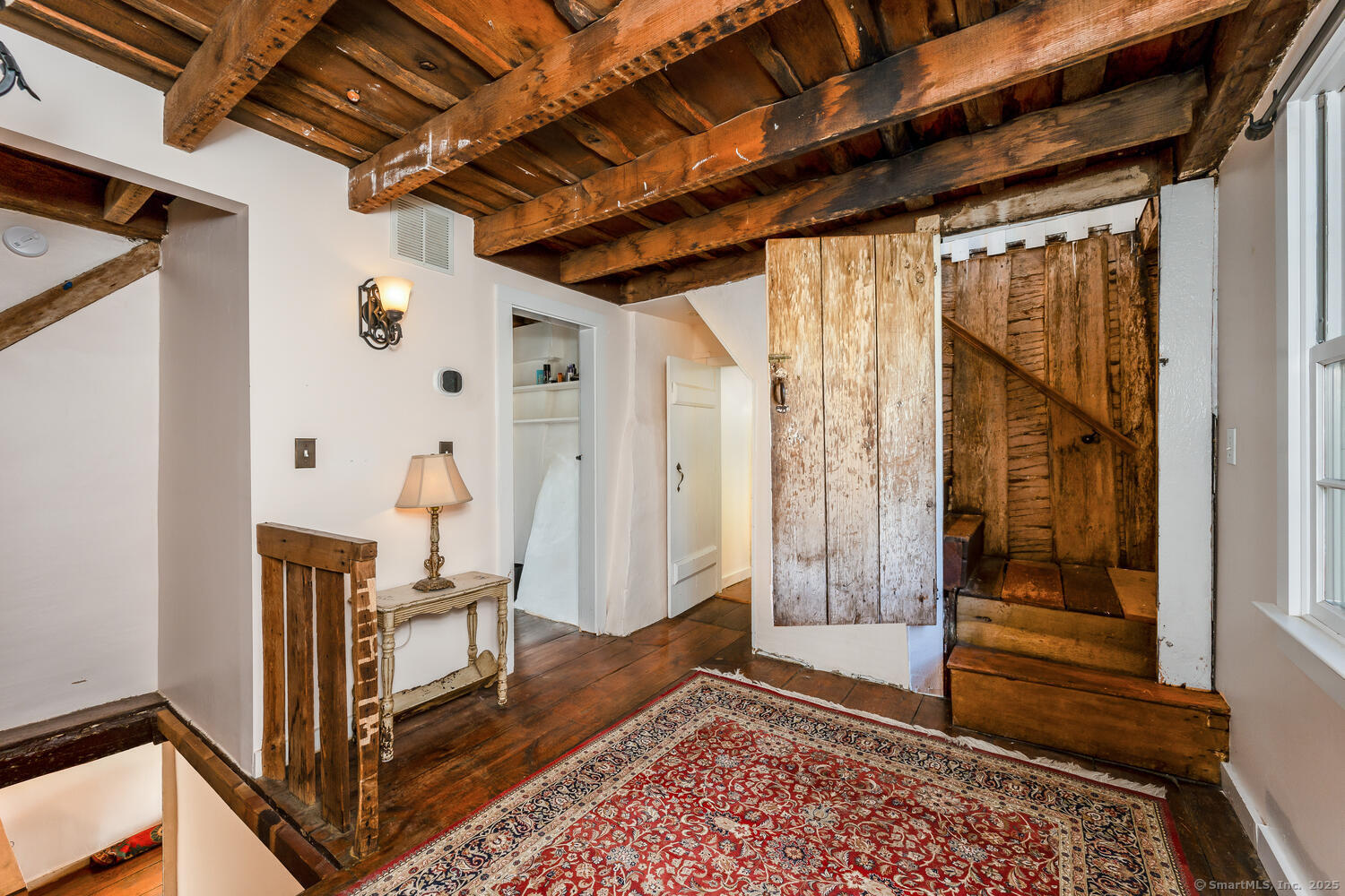 175 Mountain Road Wilton, CT 06897 - Photo 31 of 40 a view of an entryway with wooden floor