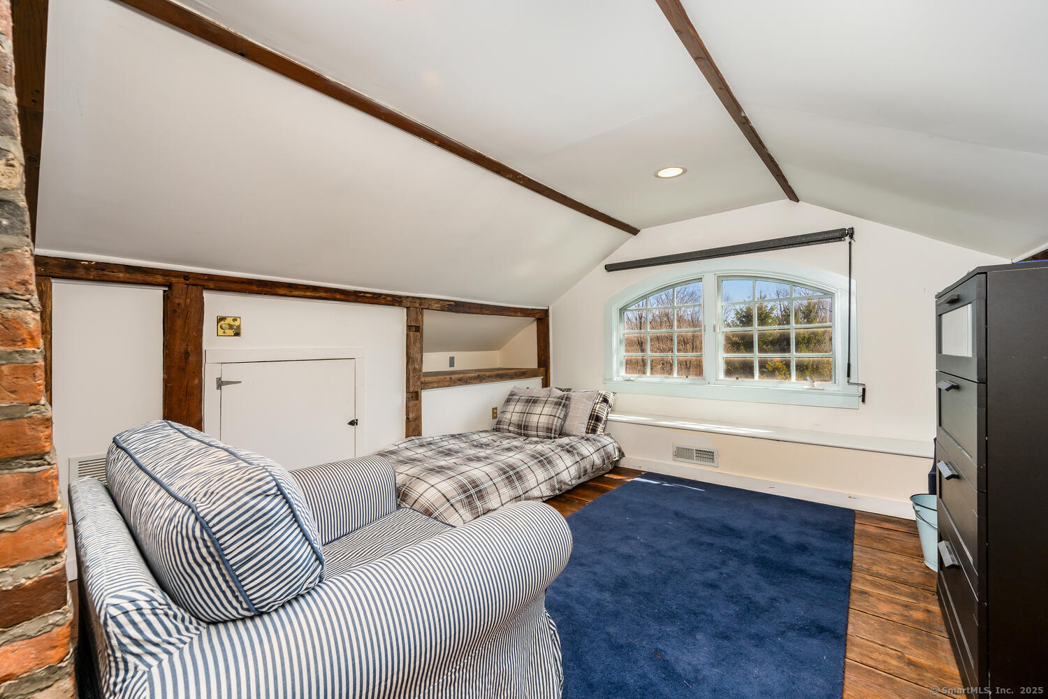 175 Mountain Road Wilton, CT 06897 - Photo 32 of 40 a living room with furniture window and wooden floor