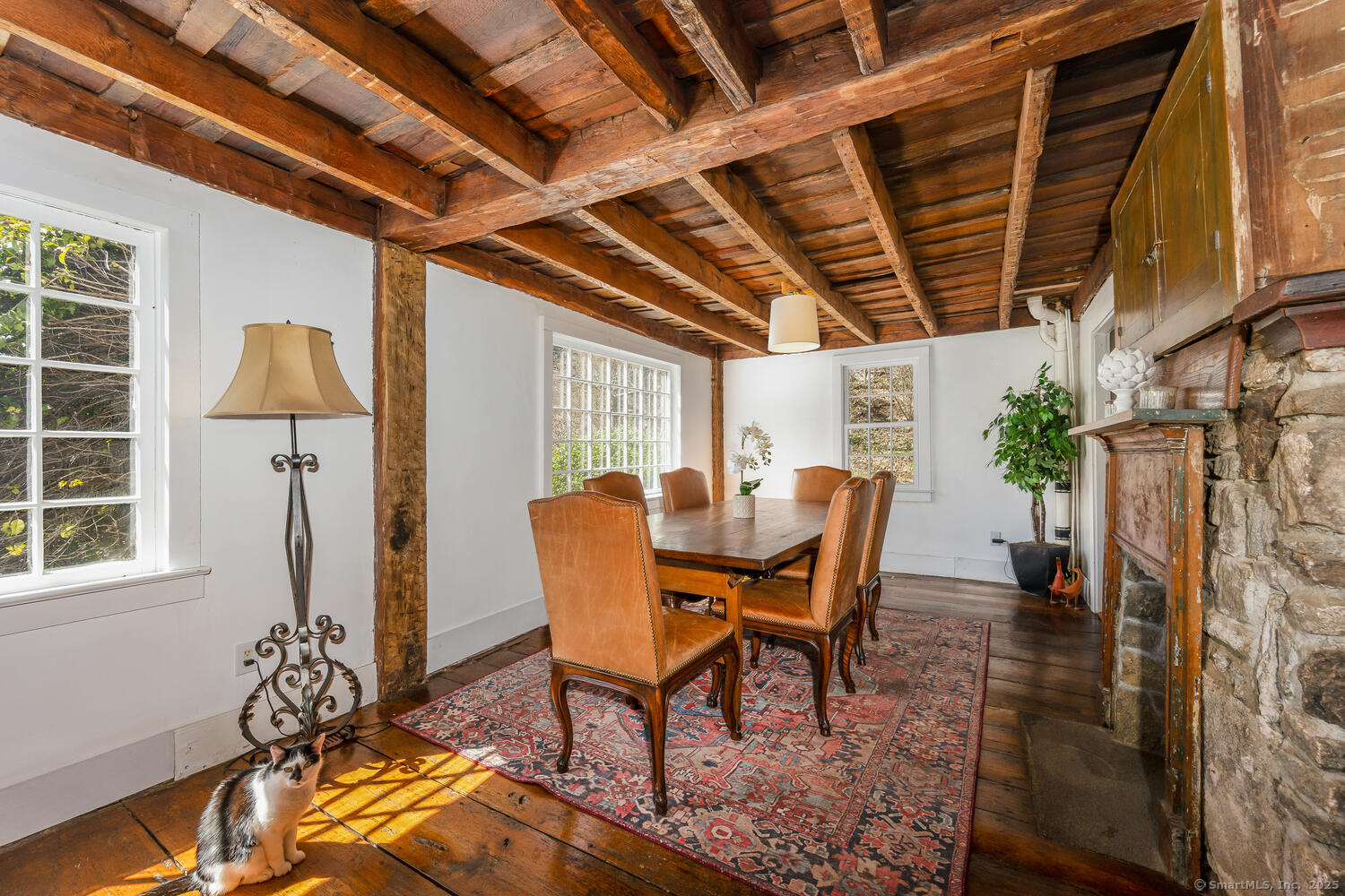 175 Mountain Road Wilton, CT 06897 - Photo 7 of 40 a view of a porch with furniture and a yard