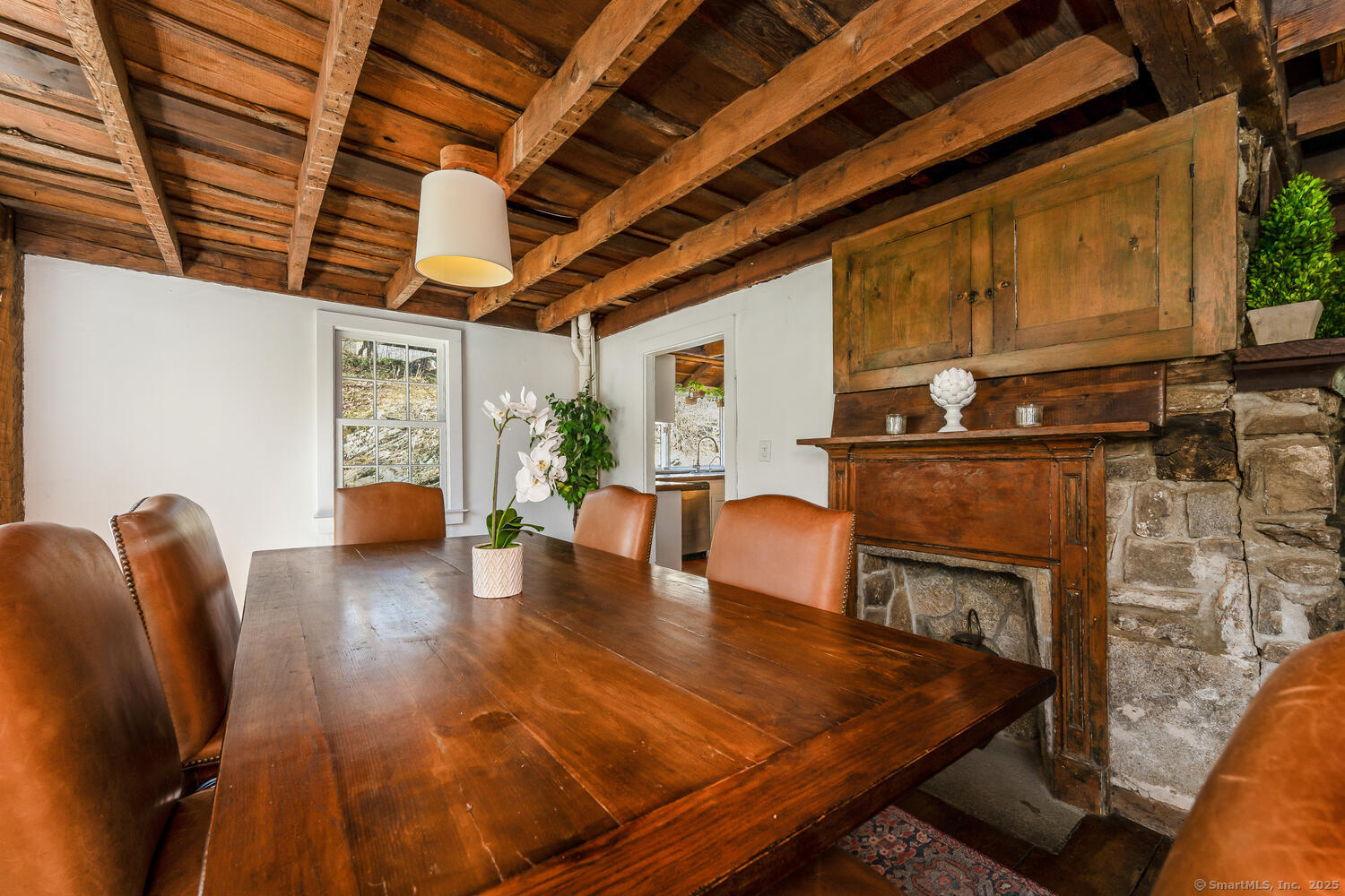175 Mountain Road Wilton, CT 06897 - Photo 8 of 40 a living room with furniture floor to ceiling window and wooden floor