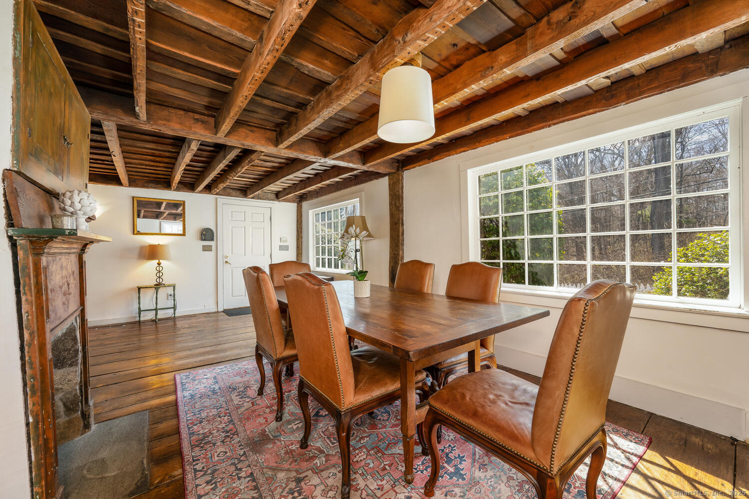 175 Mountain Road Wilton, CT 06897 - Photo 9 of 40 a view of a dining room with furniture window and outside view