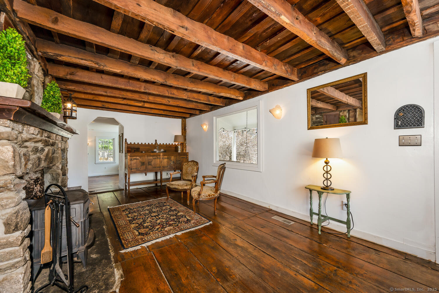 175 Mountain Road Wilton, CT 06897 - Photo 10 of 40 a view of a chairs and table in a room