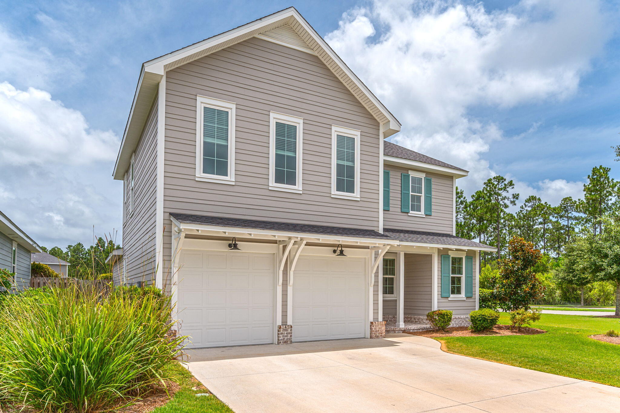 12 Windrow Way Inlet Beach Inlet Beach, FL 32461 - Photo 2 of 39 a view of a house with a yard and plants