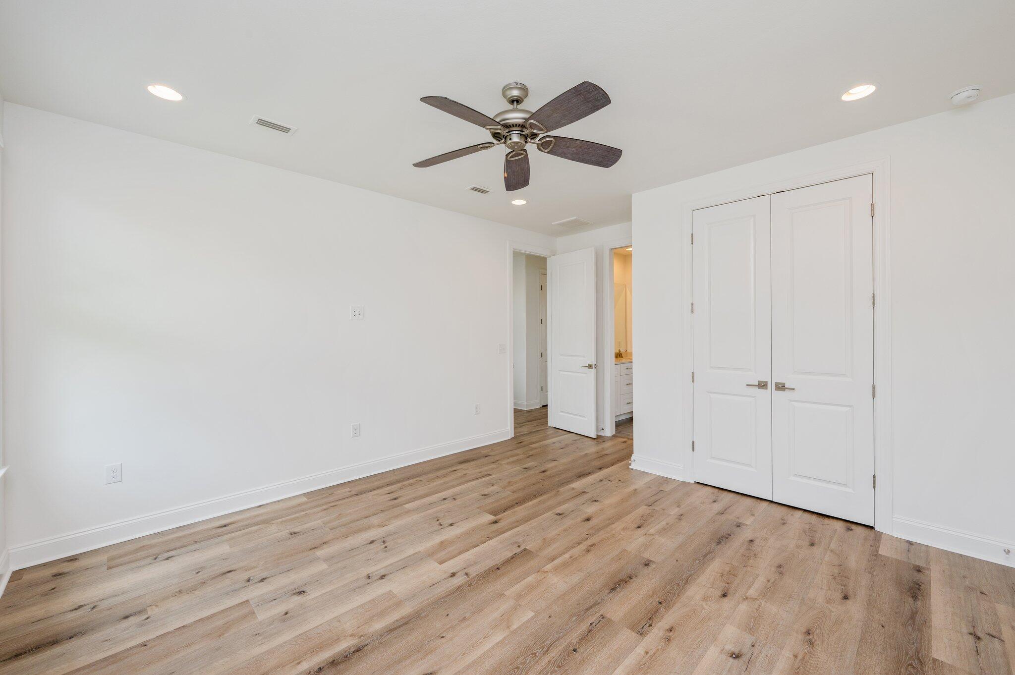 12 Windrow Way Inlet Beach Inlet Beach, FL 32461 - Photo 22 of 39 a view of an empty room with wooden floor