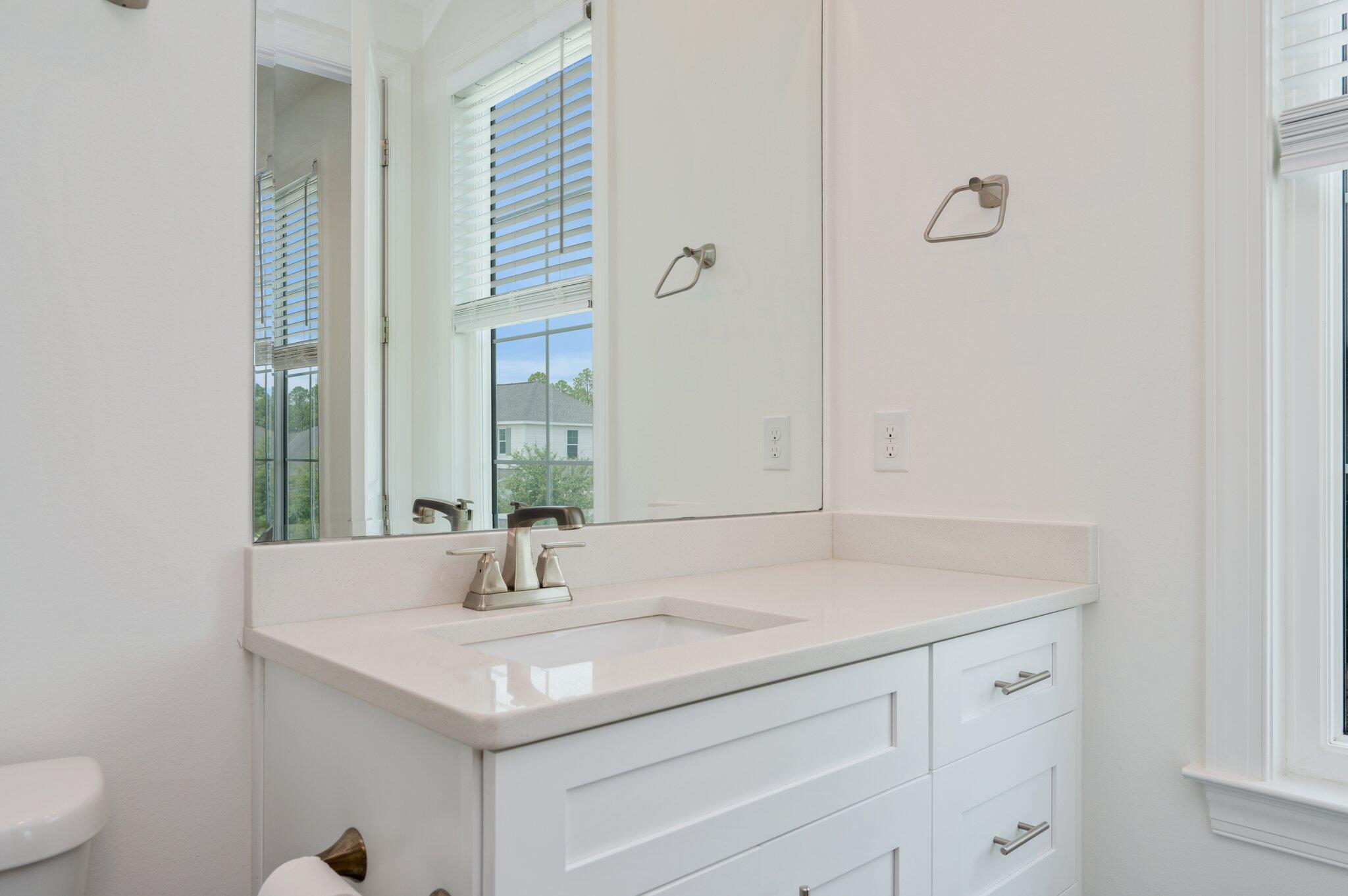 12 Windrow Way Inlet Beach Inlet Beach, FL 32461 - Photo 29 of 39 a bathroom with a sink and a mirror