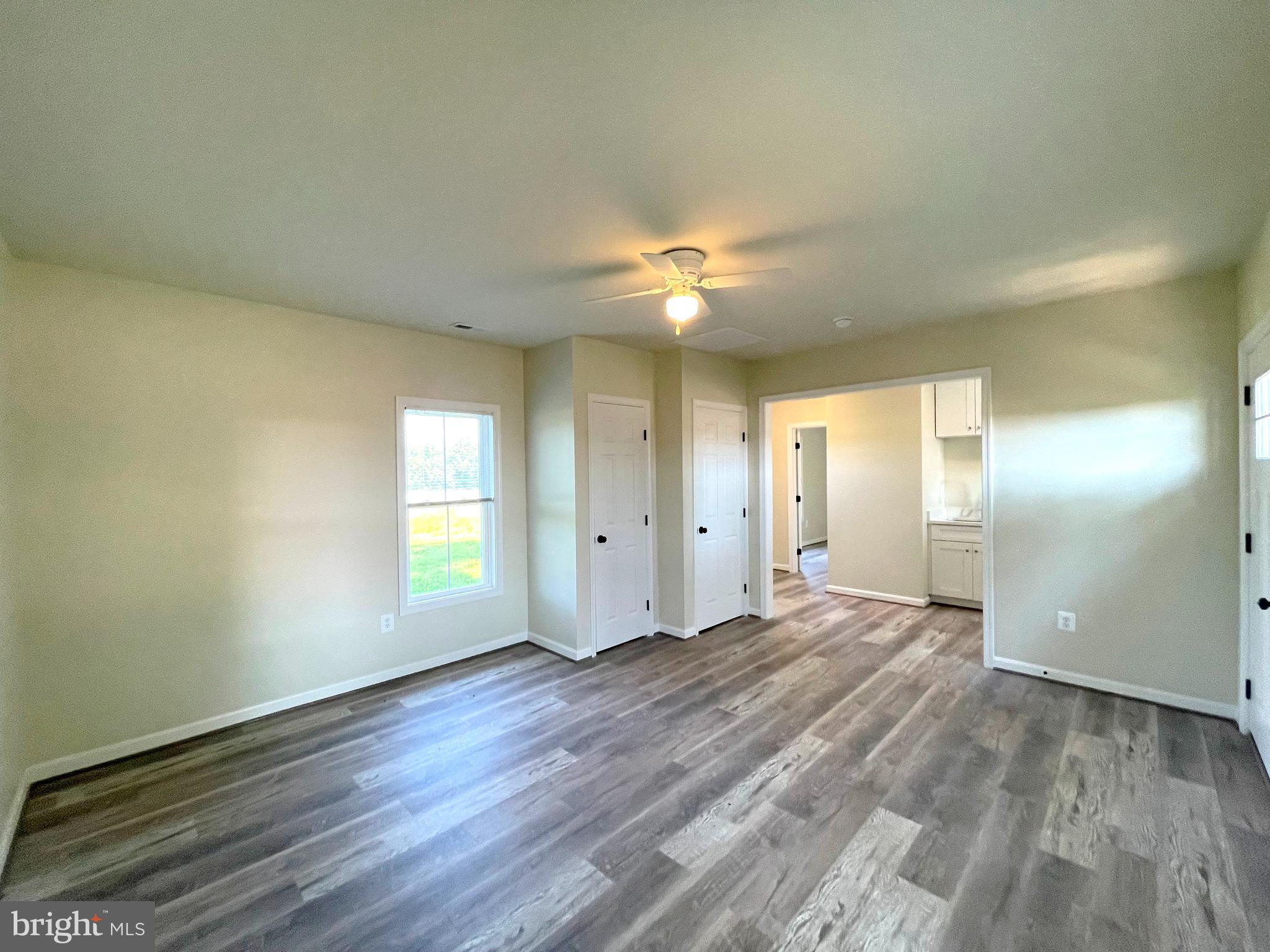 7990 Mackall Road St. Leonard, MD 20685 - Photo 4 of 18 Living/Dining areas