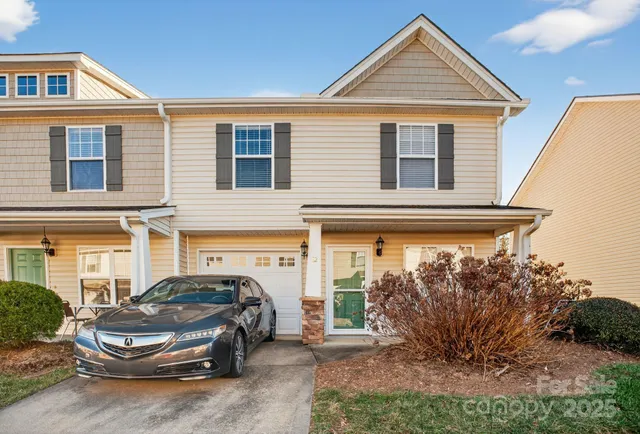 a car parked in front of a house