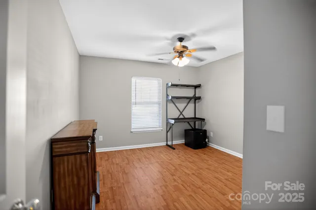 a view of a livingroom with a workspace