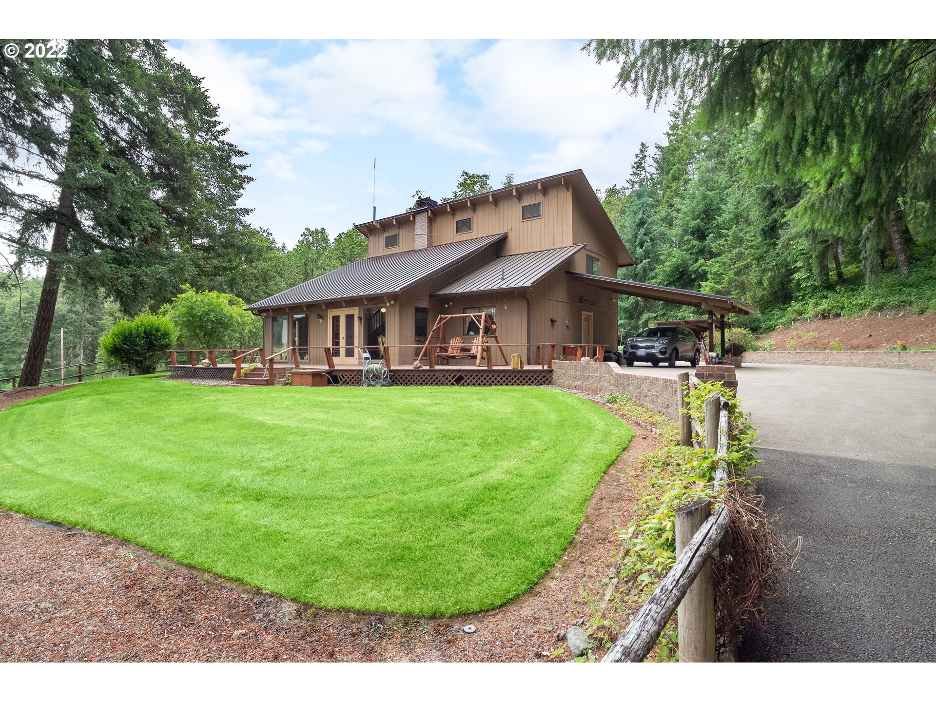 378 Racoon Road Oakland, OR 97462 - Photo 1 of 32 a view of a house with a yard porch and sitting area