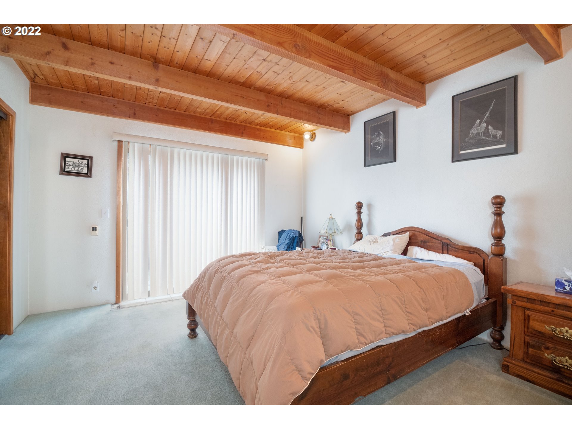378 Racoon Road Oakland, OR 97462 - Photo 11 of 32 a bedroom with bed and window