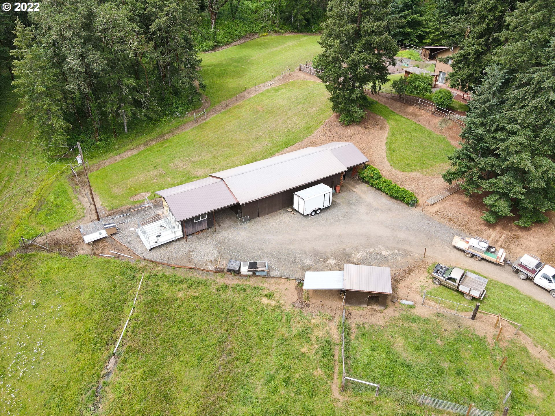 378 Racoon Road Oakland, OR 97462 - Photo 20 of 32 an aerial view of a residential houses with outdoor space and trees all around