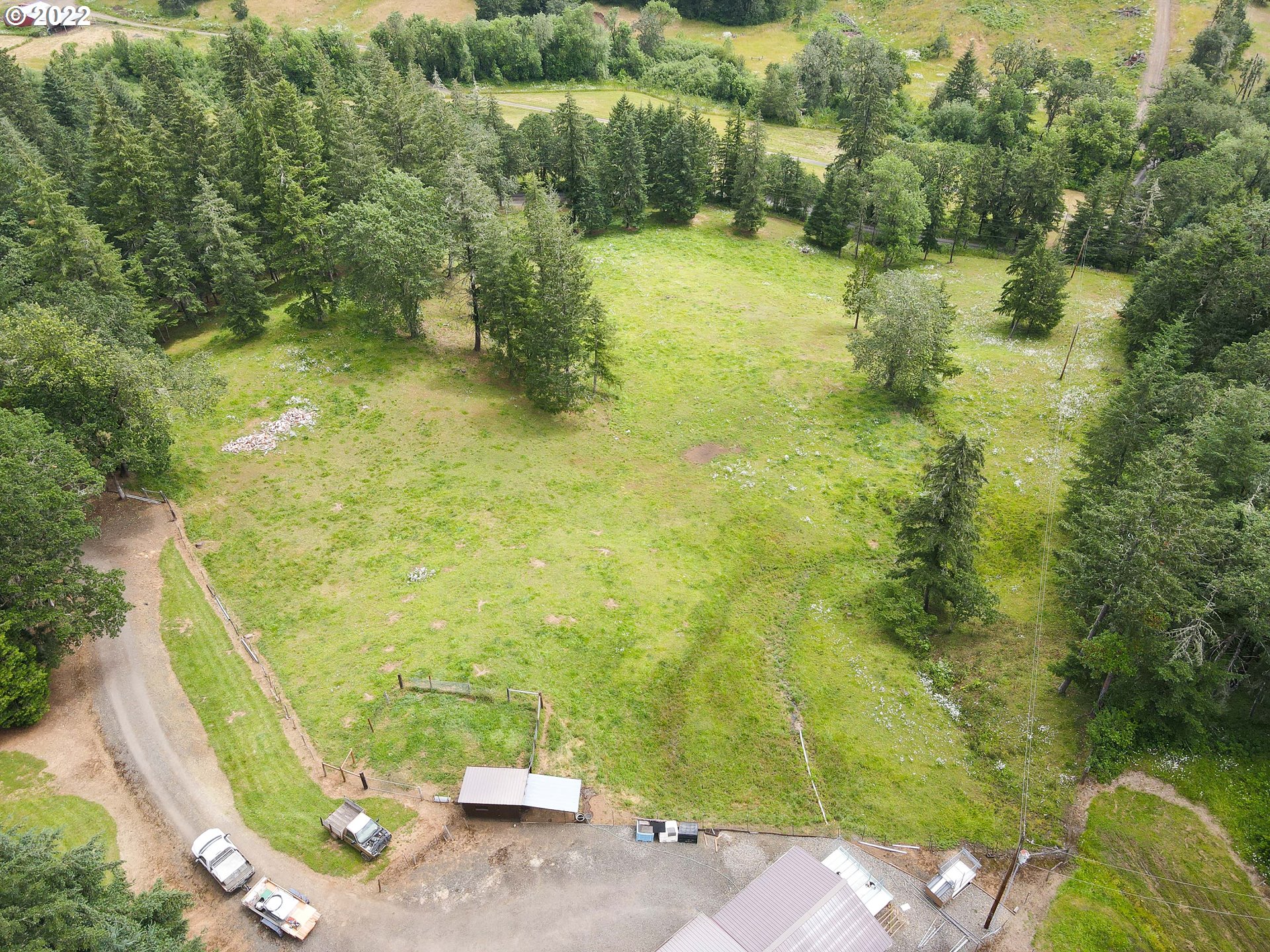378 Racoon Road Oakland, OR 97462 - Photo 30 of 32 a view of a yard with an outdoor space