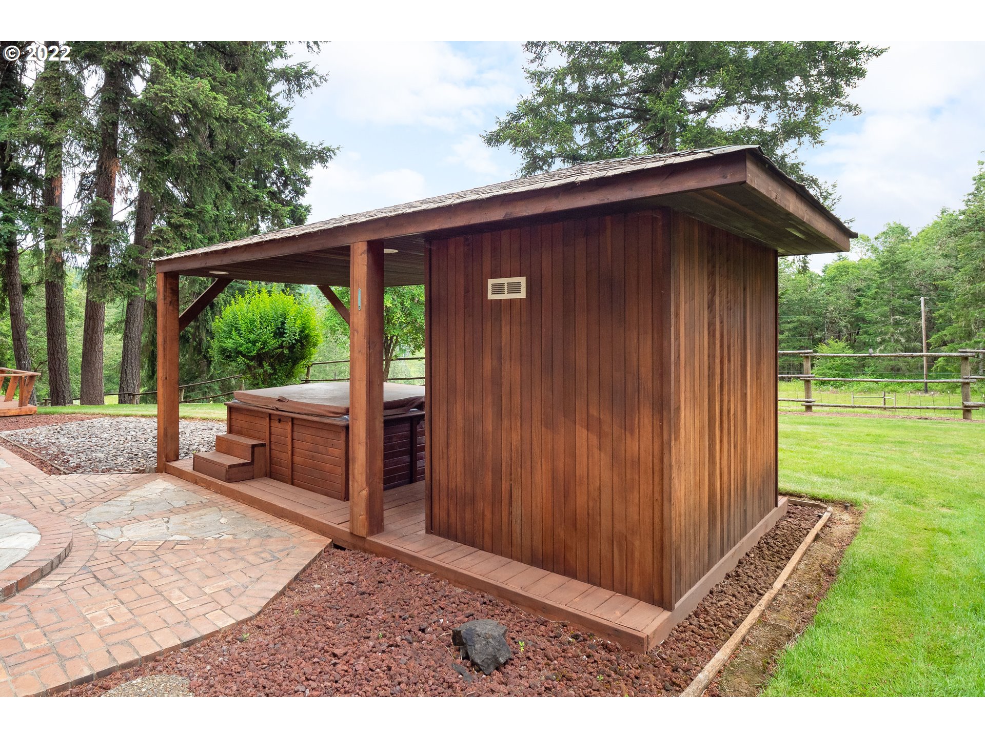 378 Racoon Road Oakland, OR 97462 - Photo 5 of 32 a backyard of a house with seating space