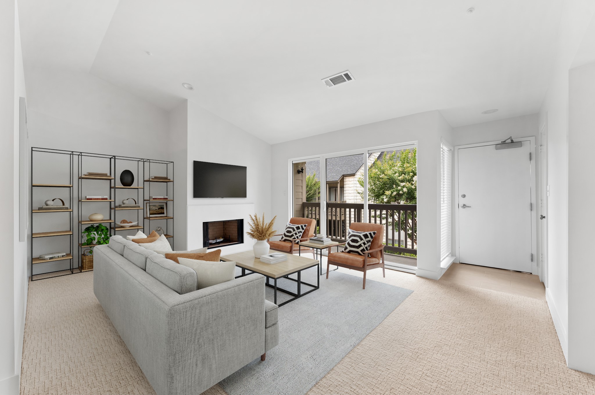 2829 Timmons Lane, Unit 202 Houston, TX 77027 - Photo 1 of 17 a living room with furniture and a flat screen tv